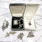 A group of silver jewellery, amethyst pendant on chain,