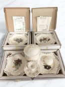 A Royal Creamware chamber stick, two further lidded pots, and a group of boxed collector's plates.