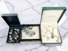 A group of silver and white metal mounted jewellery including necklace,