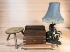 A patinated metal figural table lamp, a Victorian brass bound writing slope, jewellery chest,