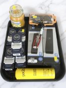 A group of ex-retail items including a Yankee candle, five packs of Nivea Men moisturiser,