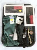 A pair of Nike thermal gloves, a pair of Cool Kids tracksuit bottoms,