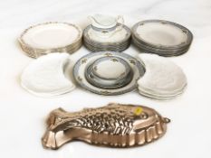 A quantity of English pottery dinner wares, Wedgwood Country Ware dishes, a fish jelly mould, etc.
