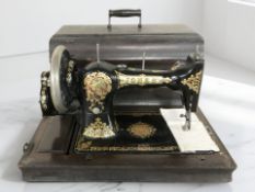 An antique Jones hand sewing machine.