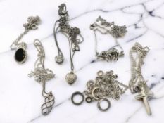 A group of Sterling silver pendants on chains, crucifix on chain etc.