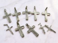 Ten silver crucifix pendants CONDITION REPORT: 34g