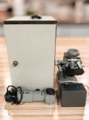 A Brunel 16 Series double scope microscope, in carry case with instruction booklet.