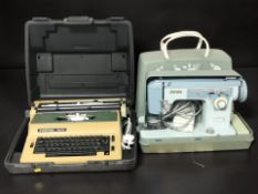 A silver Reed typewriter and a Jones sewing machine.