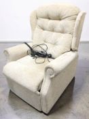 An electric reclining armchair.