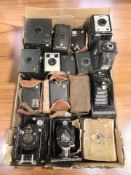 A collection of antique plate and other cameras, Brownie cameras, coronet, etc.