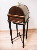 A reproduction hardwood domed decanter box on stand containing two decanters, height 114 cm.