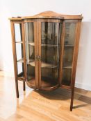 A late Victorian mahogany and satinwood inlaid bow front display cabinet, 90 cm x 38 cm x 130 cm.