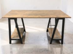 A metal and pine effect desk fitted shelves to either side, 140 cm x 60 cm x 74 cm.