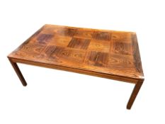 A Norwegian mid-century Brazilian rosewood (Dalbergia Nigra) coffee table, manufactured by Heggen,