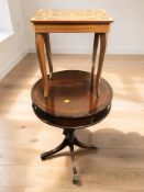 A reproduction inlaid mahogany drum table, diameter 50 cm, and an Italian inlaid musical workbox.