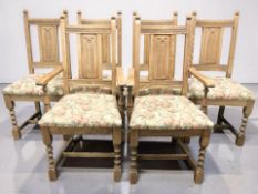 A set of six Old Charm oak dining chairs.