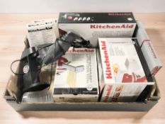 Assorted Kitchen Aid utensils including pasta roller, spiraliser, etc.