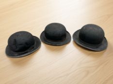 Three bowler hats retailed by Guesdon of Paris, Sunfield of London, and Queensbury.