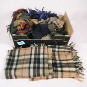 A collection of tartan blankets.