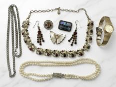 A Seiko lady's wristwatch, a faux pearl necklace, paste-set costume necklace and earrings,