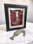 An Arabic jambiya knife in sheath, in a contemporary glazed display frame, overall 43 cm x 38 cm,