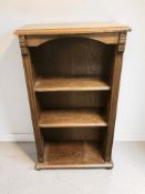 A 20th century oak open bookcase, 55 cm x 26 cm x 97 cm.
