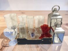 A group of storm lanterns, large glass vases, etc.