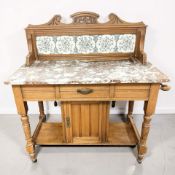 A late Victorian satin walnut marble topped wash stand, 96 cm x 49 cm x 105 cm.