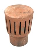 A terracotta chimney cap, height 37 cm.