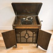 An early 20th century oak cased gramophone, width 70 cm.