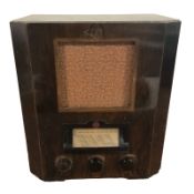 A mid-century valve radio, height 43 cm.