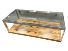 A Merrow Associates polished steel, glass and Brazilian rosewood (Dalbergia Nigra) coffee table,