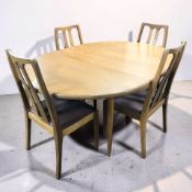 A Nathan teak oval extending dining table with leaf, extended 167 cm x 123 cm x 74 cm,