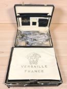 A case of Versailles France gilt stainless steel table cutlery.
