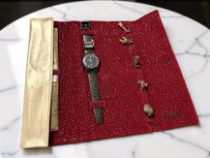 A Swatch watch 'World Party Christmas 2000'.