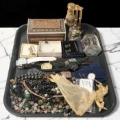 A group of wristwatches, various costume jewellery, cast metal figures,