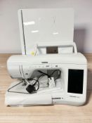 A Brother Innov-Is VQ2 digital sewing machine, with lead and pedal.