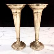 A pair of loaded silver trumpet bud vases, height 19.5 cm.