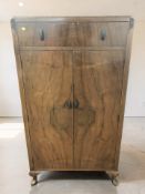A 20th century figured walnut linen cabinet, 76 cm x 44 cm x 138 cm.