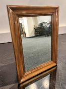 A 19th century continental walnut wall mirror, 82 cm x 63 cm.