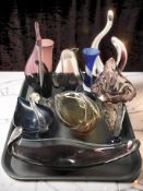 A collection of art glass vases and bowls.