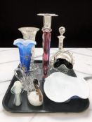 A group of studio glass including two large candlesticks, paperweights, basket,