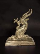 A Victorian brass door stop in the form of a goat, height 16 cm.