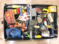 A suitcase containing assorted hand tools, hardware, etc.
