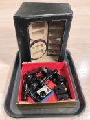 An automatic watch winder and a small group of electricals, dash cams, etc.