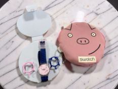 A Swatch watch 'Happy Pig Club Special 1998'.