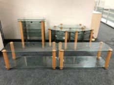 A group of contemporary glass 'Stands Unique' coffee tables and audio cabinets / stands