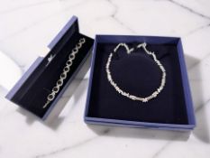 A Swarovski crystal costume necklace and a further panel bracelet, both boxed.