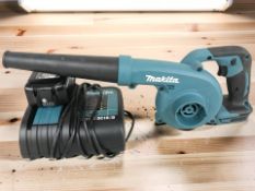 A Makita DUB185 handheld blower with power pack.