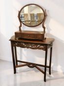 A reproduction carved mahogany console table, width 82 cm,